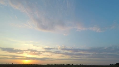 Peaceful Sunset Sky Over Rural Landscape