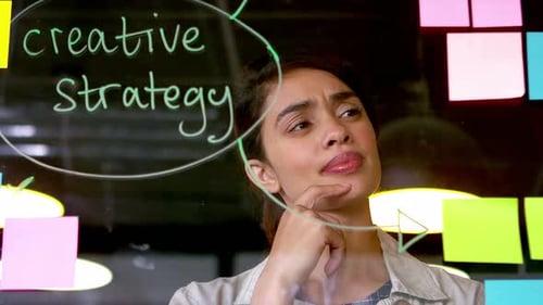 Woman Thinking About Creative Strategy At Work
