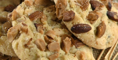 Fresh Almond Cookies with Wheat Stalks Close Up