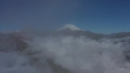 Aerial View of Clouds and Mountains at Sunrise