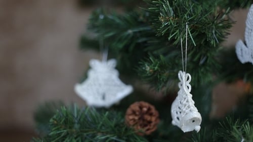 Christmas Tree with Bell Ornaments and Pinecones