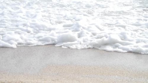 Sea Waves Splashing Sand Beach