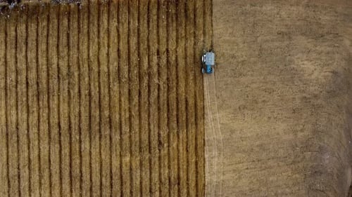 Tractor Plowing Field From Above