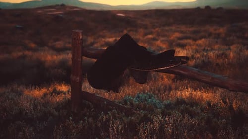Old Saddle As the Sunset in the Country
