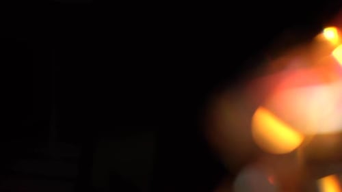 Abstract Lights Bokeh in Yellow Red White and Orange. Black Background