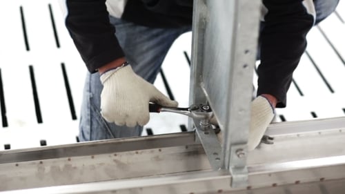 Workers Build a Metal Structure Wrench