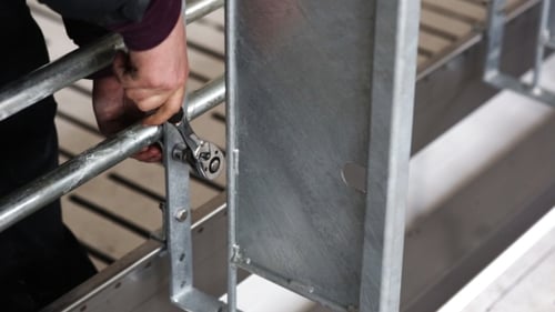 Man To Tighten The Screws With a Wrench