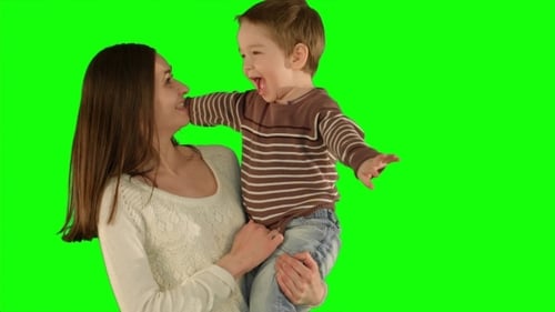 Happy Family Having Fun On a Green Screen