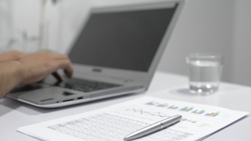 Man Working in Office, Working on Laptop