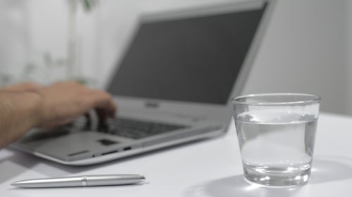 Typing on Laptop with Water and Pen