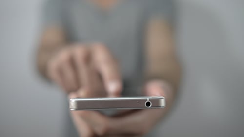 Close Up of Person Using Mobile Phone
