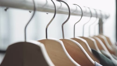 On Floor Stand for Clothes Hanging Wooden Hangers with Things