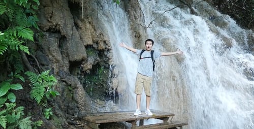 Man Happy With Waterfall