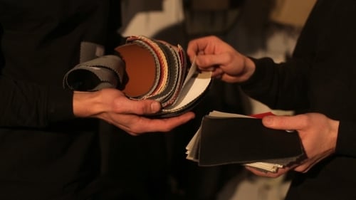 People Looking at Material and Fabric Swatches Close Up