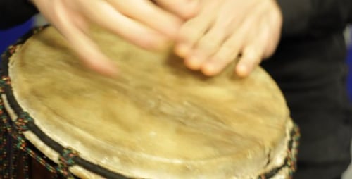 Playing a Djembe in the Studio