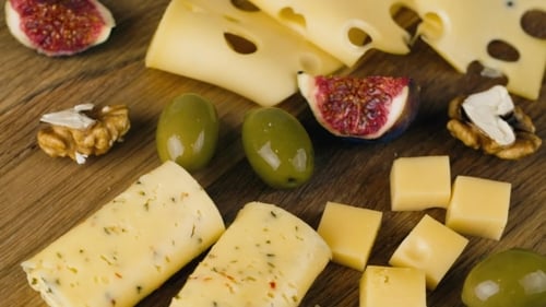 Cheese, Olives, Figs, and Walnuts on Board