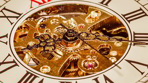 Close Up of Intricate Clock Gears Turning