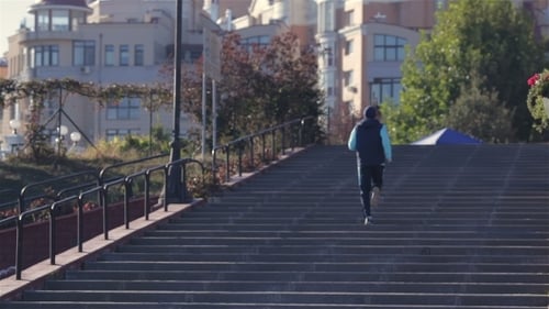 Healthy Male Athletes Running Working Out a Cardio