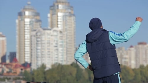 Stretching Before Morning Run In The City