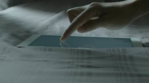 Tablet On Bed