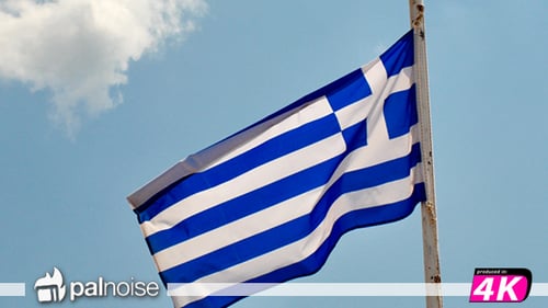 Greek Flag Waving Against a Blue Sky