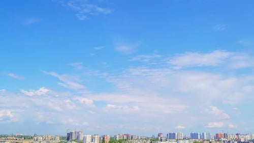 Clouds in the Blue Sky Over the City