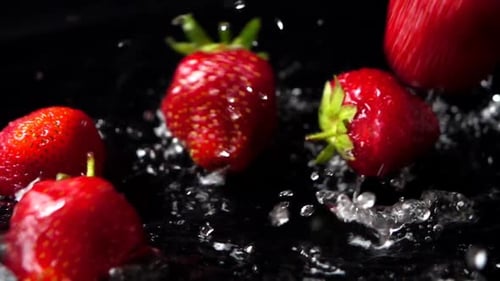 The Falling Strawberry in Water