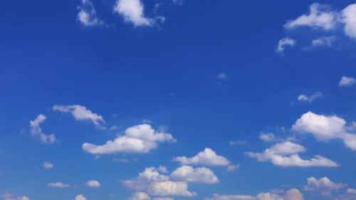 Clouds Drifting Across a Vibrant Blue Sky