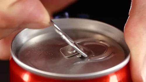 Hand Opening Can, Close Up, on Black, Slow Motion