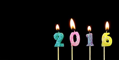 Number Candles Spelling 2016 on Black Background