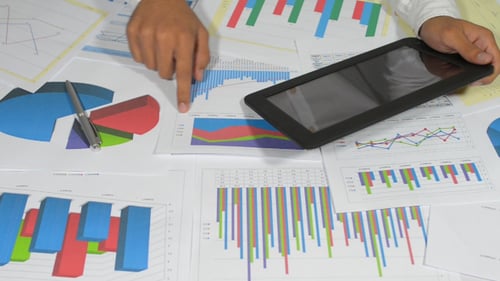 Businessman Using Tablet for Office Work
