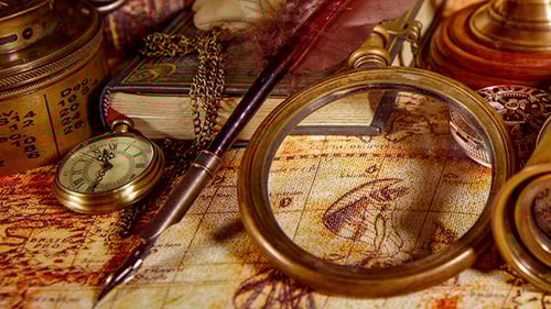 Antique Brass Instruments on World Map Still Life