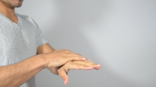 Putting Cream on Hands