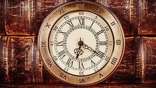 Time Flies on Antique Pocket Watch and Books