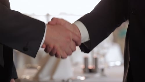 The Men Shake Hands