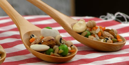 Assorted Beans and Peas in Wooden Spoons