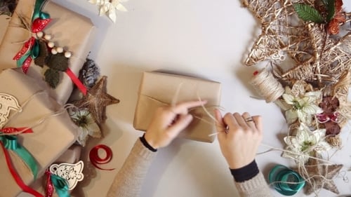 Top View Woman Wrapping Christmas Presents