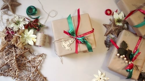 Creative Gift Wrapping with Wooden Ornaments and Ribbons