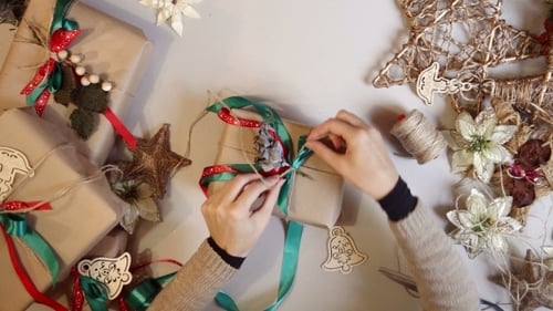Top View Woman Wrapping Christmas Presents