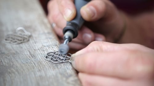 Goldsmith Polishing Silver Earring With Grinder