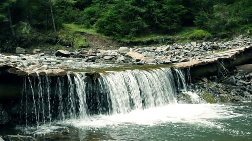 Mountain River With Small Waterfall