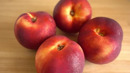 Close Up of Fresh, Red Flat Peaches