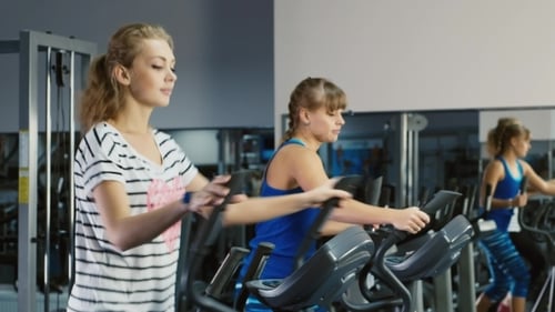 At a Training Session. Two Attractive Women