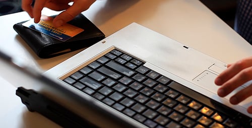 Typing Credit Card Information into Laptop