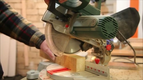 Carpenter Cuts Wooden Blocks Machine Tool