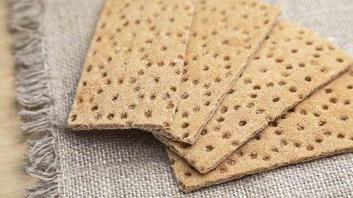 Crispbread Stacked on Burlap in Natural Light