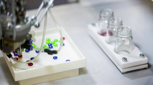 Robotic Arm Sorting Colorful Beads into Jars