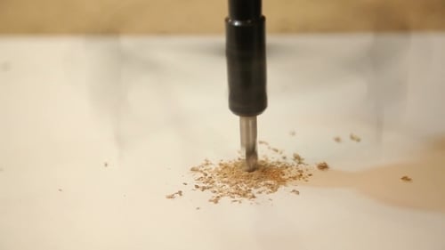 Carpenter Drill Holes With a Drill