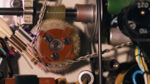 Close Up of Cogs Turning in Machine