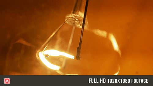 Glowing Light Bulb Filament Extreme Close Up